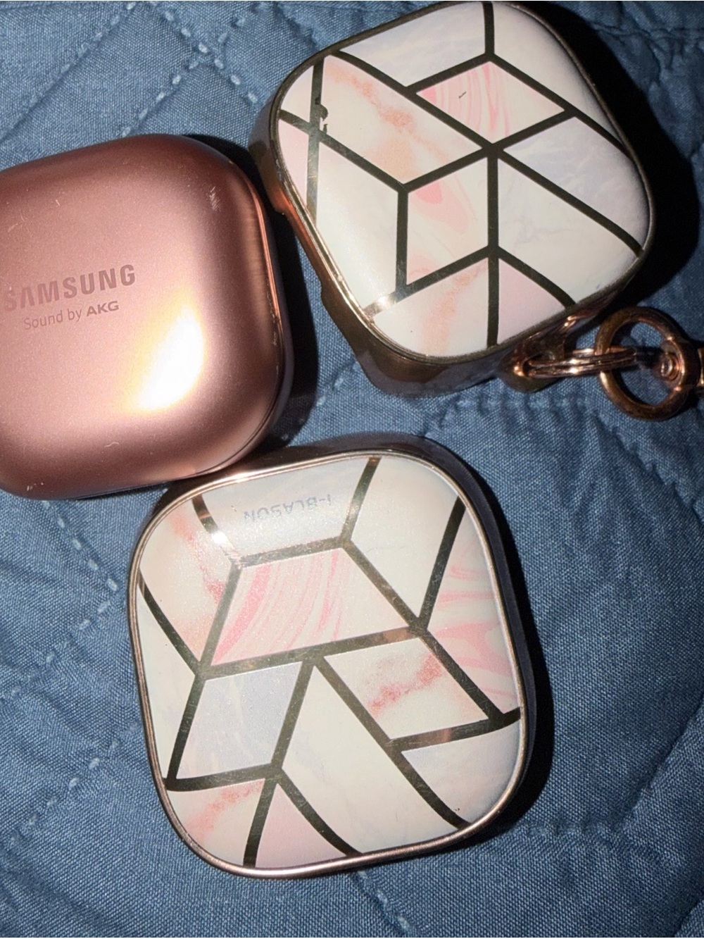 Samsung Earbuds with Charging Case in Rose Copper and Carrying case included.